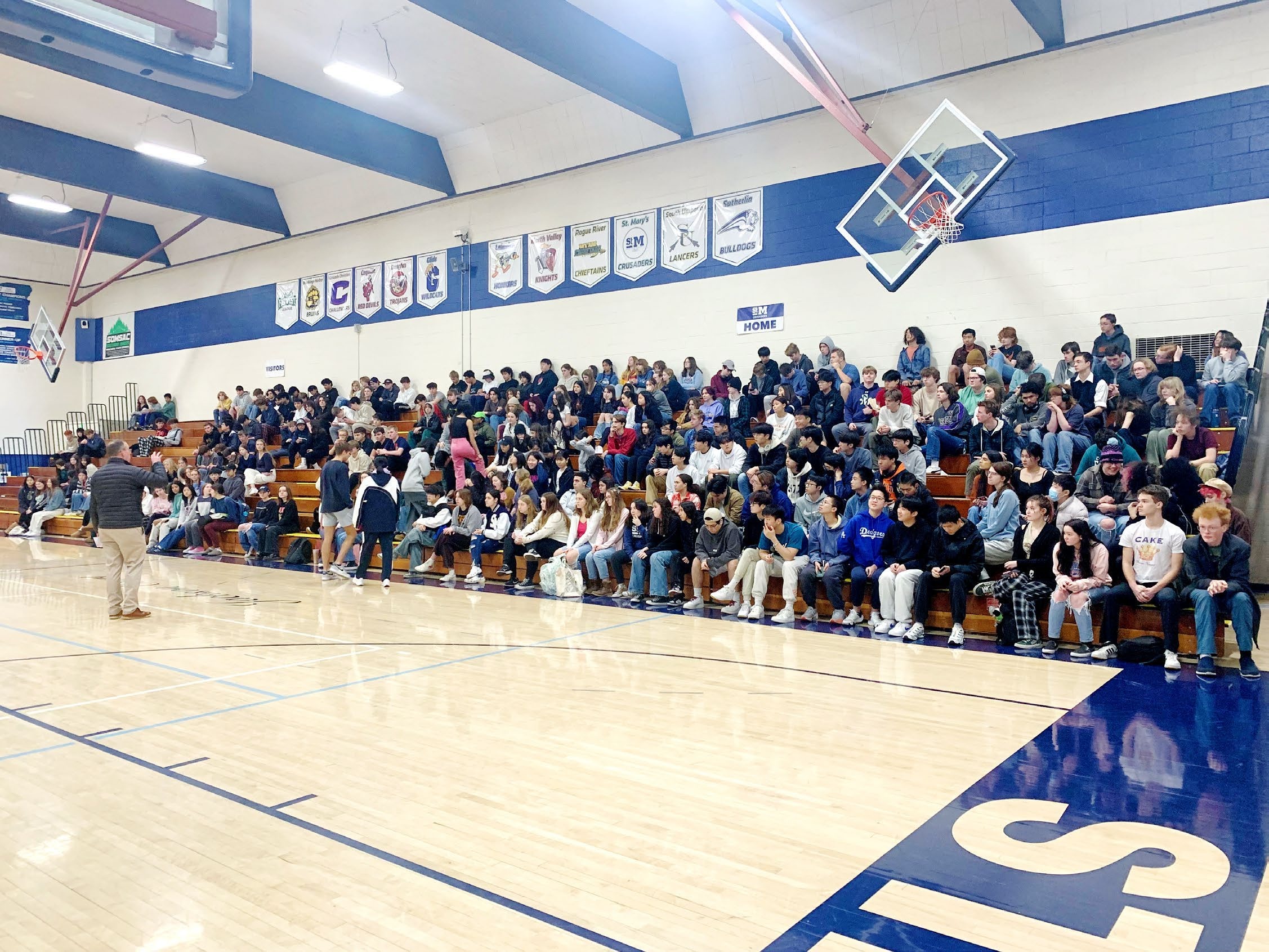Winter camp participants and students in the St. Mary’s School gymnasium