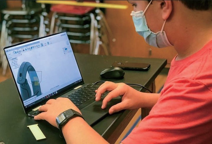A Barstow student working on a digital engineering design